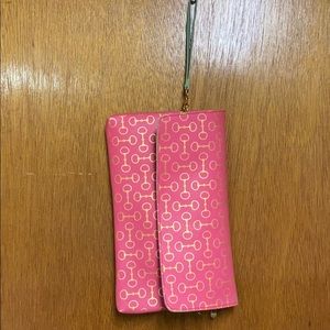 Large multi-way pink buckle print clutch